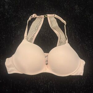 Light pink, lightly padded -wire bra. Victoria’s Secret brand. Cute lace straps
